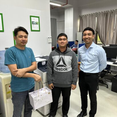 Our sales consultant with our customer and the photocopy machine