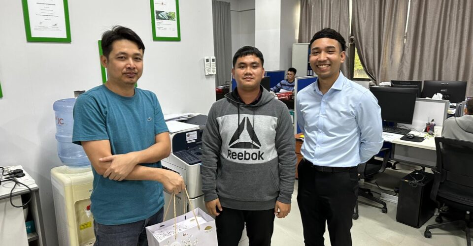 Our sales consultant with our customer and the photocopy machine