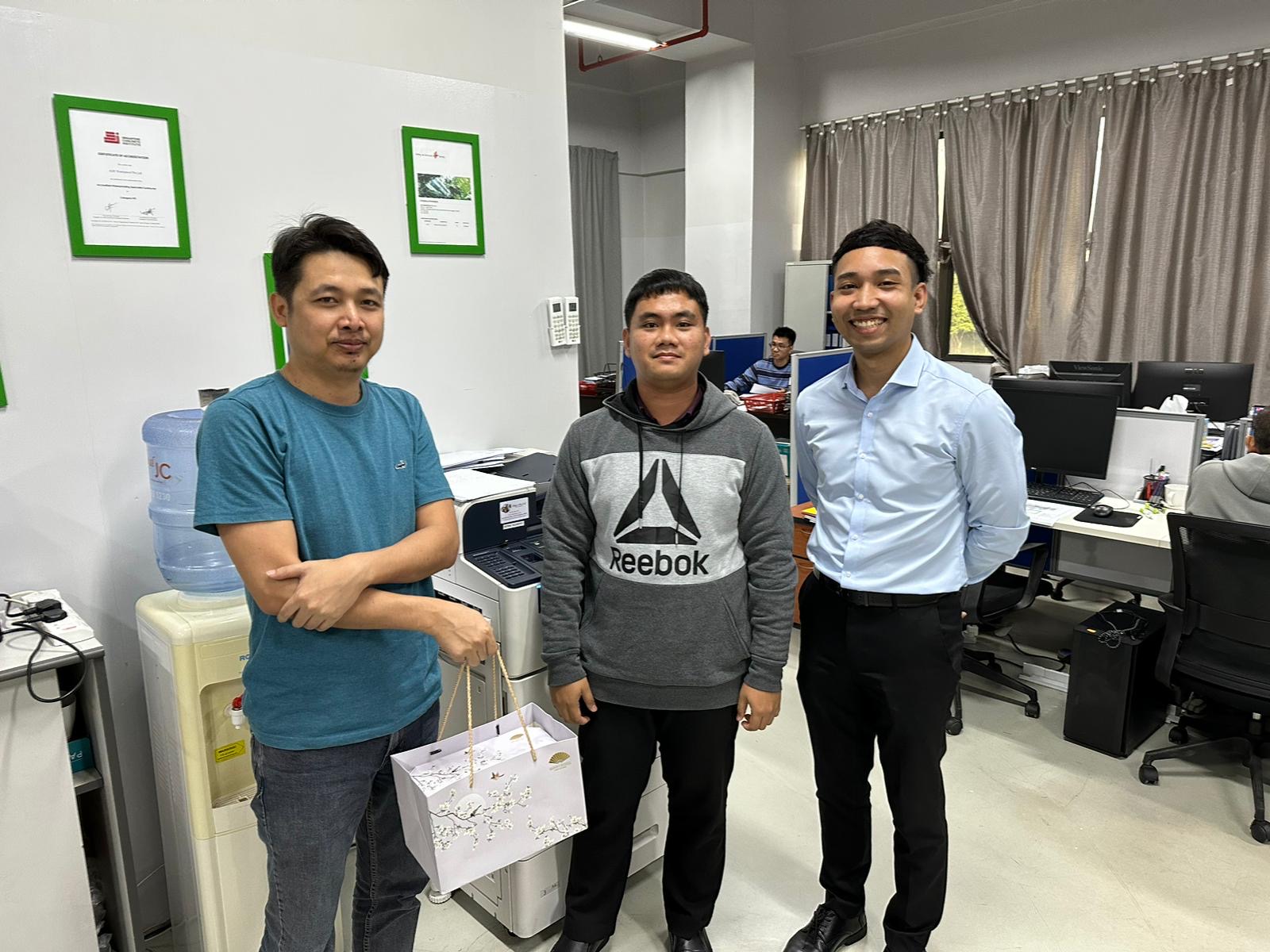Our sales consultant with our customer and the photocopy machine